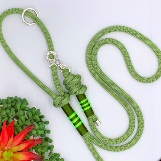 Green nylon rope leash with green accen thread and silver hardware. 